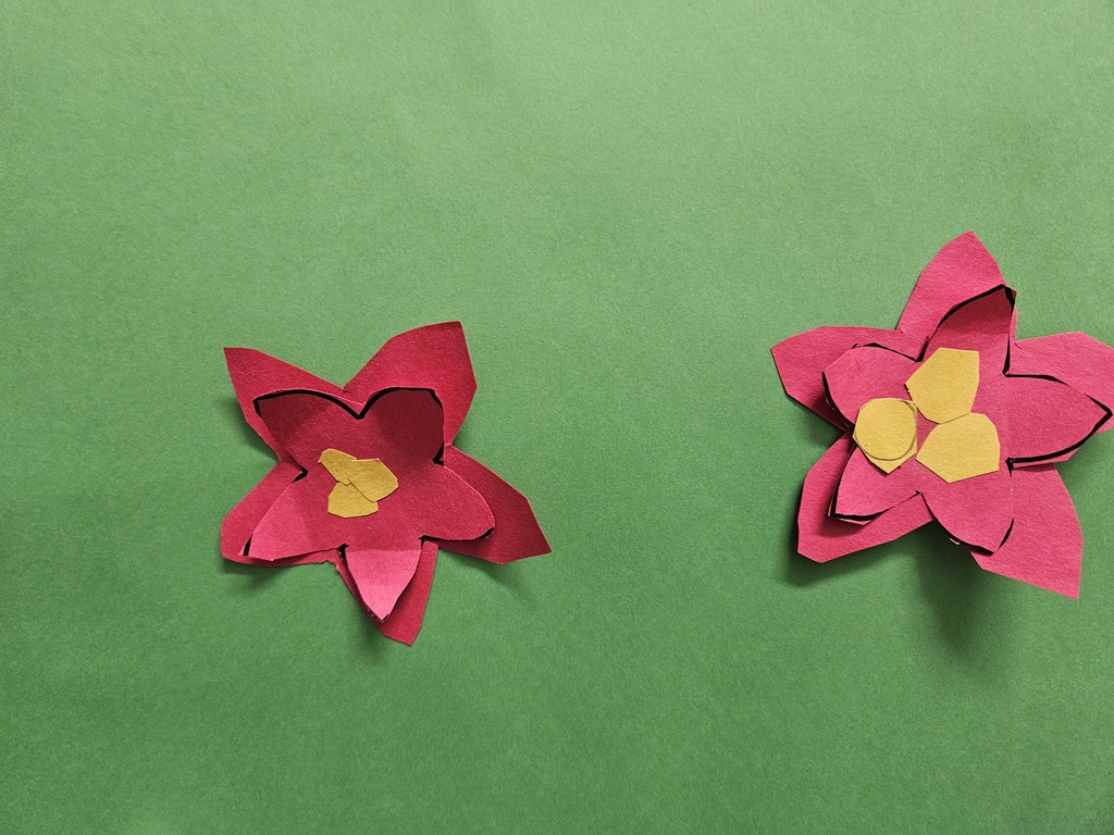 2 paper pointsettias 