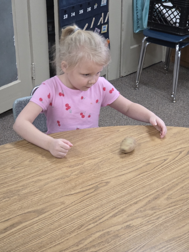 1 girl spinning a potato 