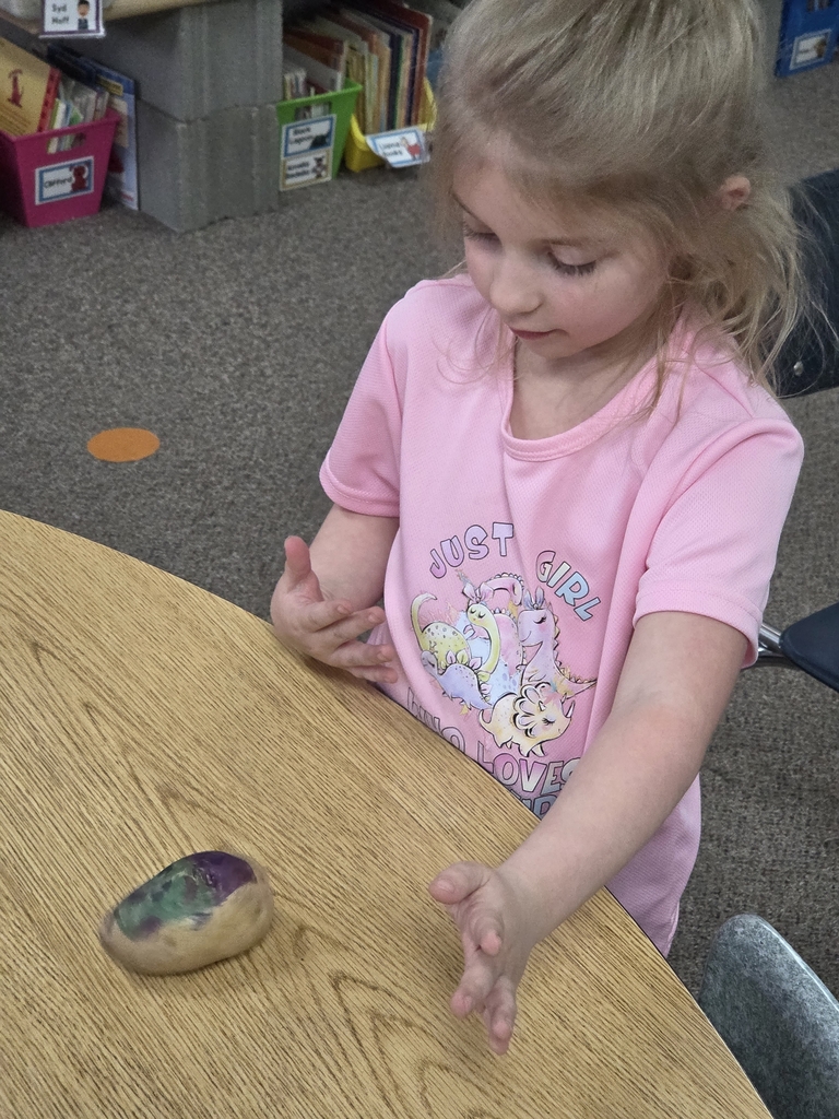 1 girl spinning a potato 