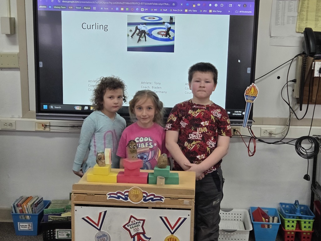 2 girls and 1 boy with potatoes