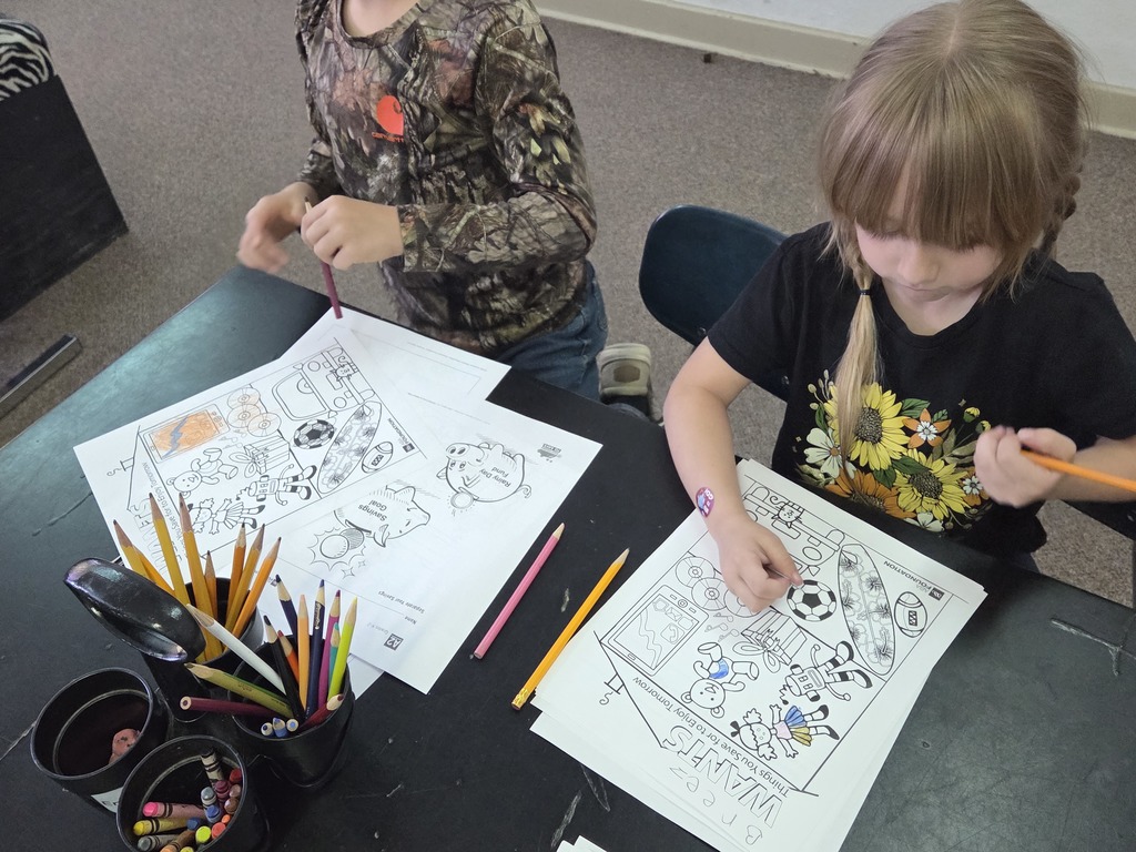 1 boy and 1 girl coloring 