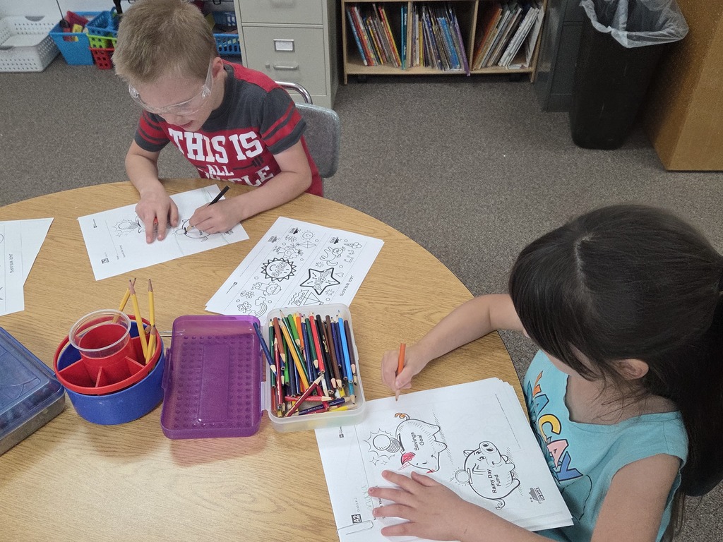 1 boy and 1 girl coloring 