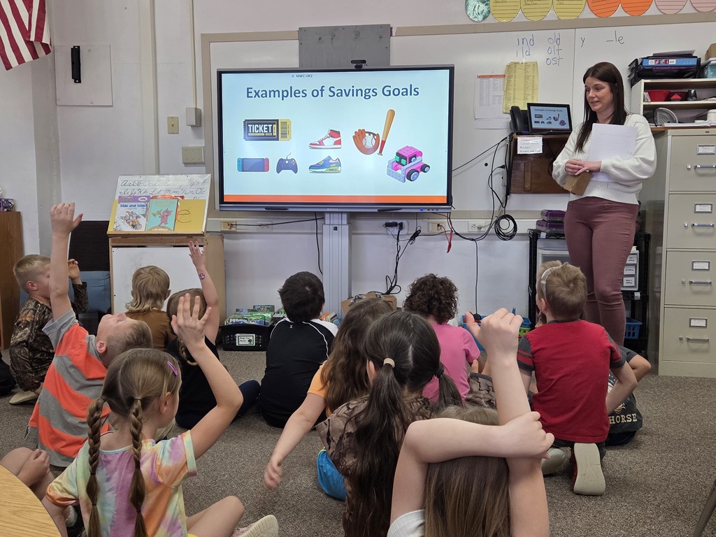 12 kids listening to an adult 