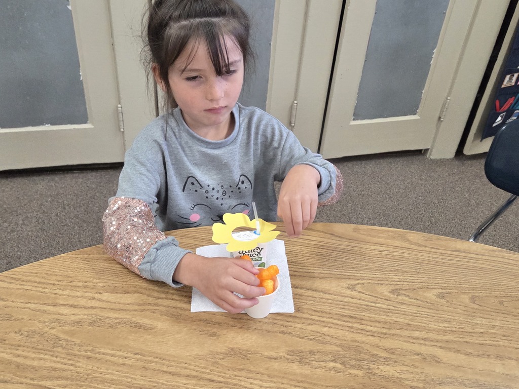 a girl drinking juice