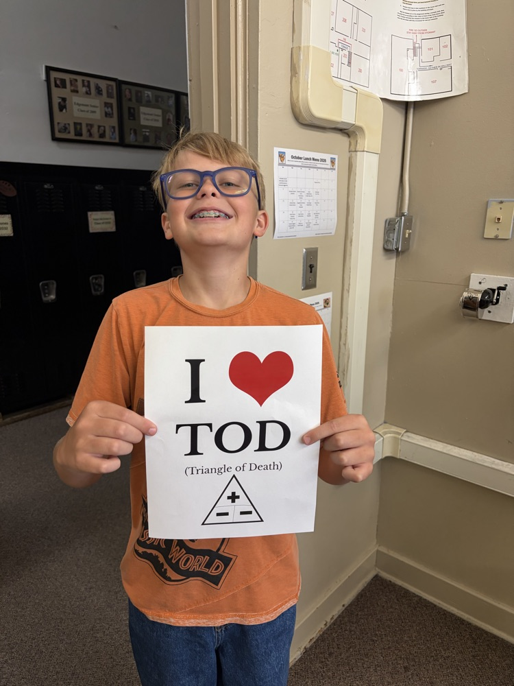 Student holding poster. 