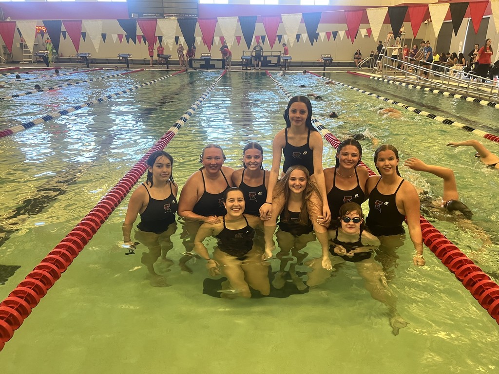 Team photo in the pool