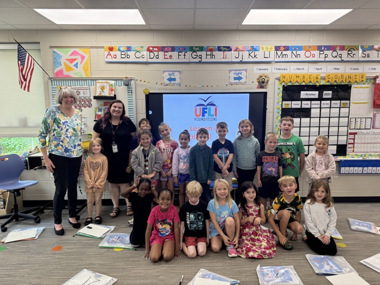 group photo in a classroom. 