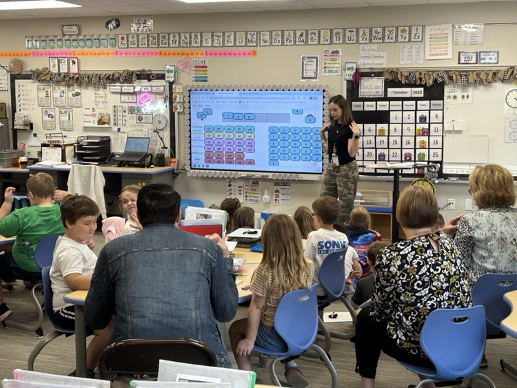group photo in a classroom. 