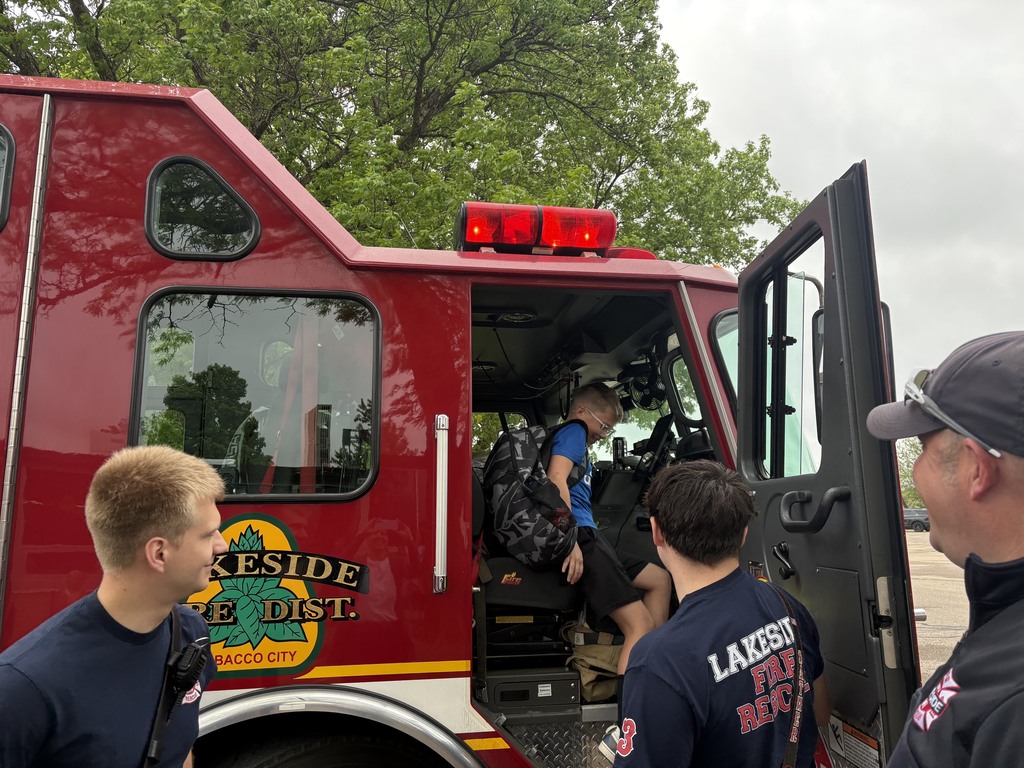 Student Climbing into the fire truck.