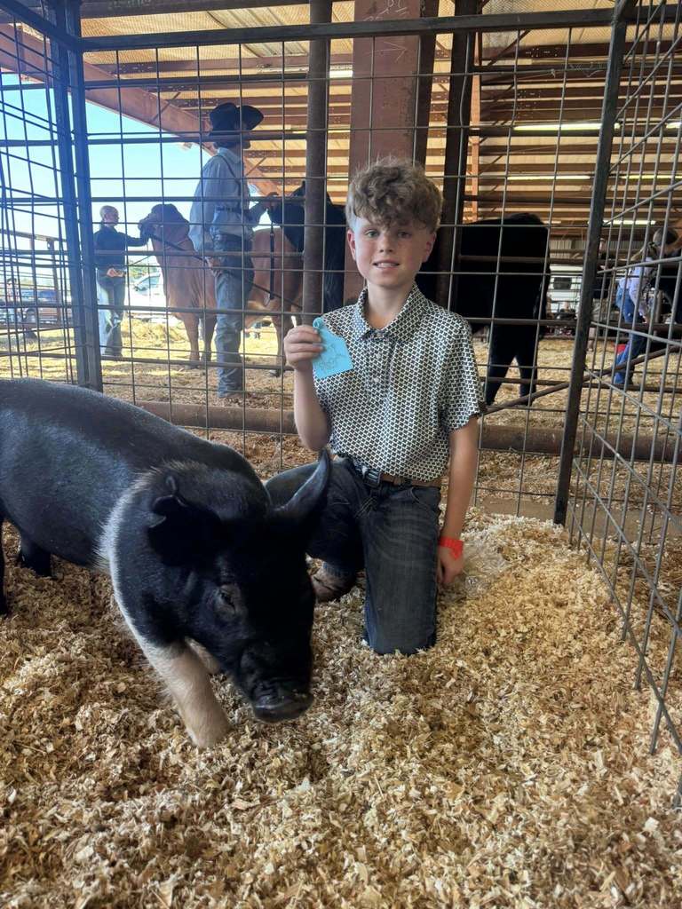 Congratulations to R. Jones and D. Mason on exhibiting their market pigs in Jacksonville today.  D. Mason placed first in his class  R. Jones placed 3rd in her class