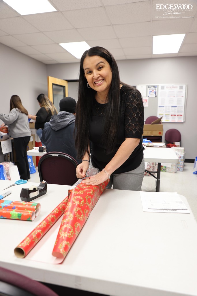 EISD staff helps wrap christmas gifts