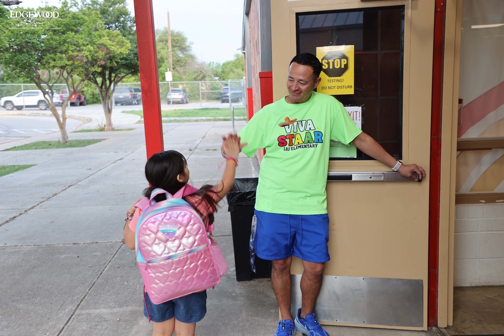 High-five to start the day before STARR testing