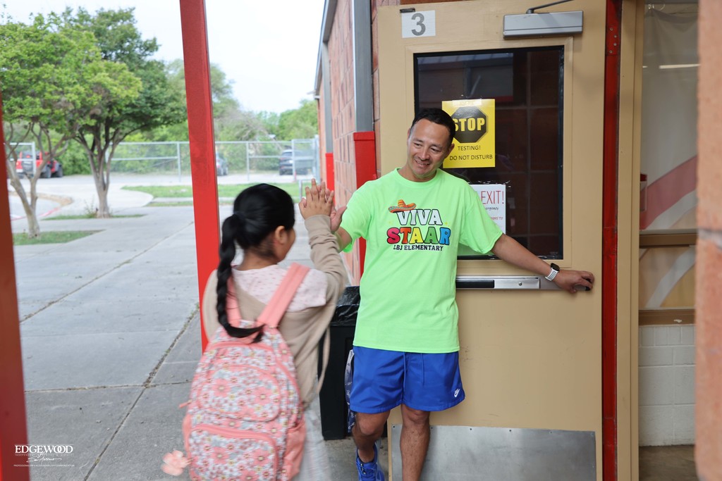 High-five to start the day before STARR testing