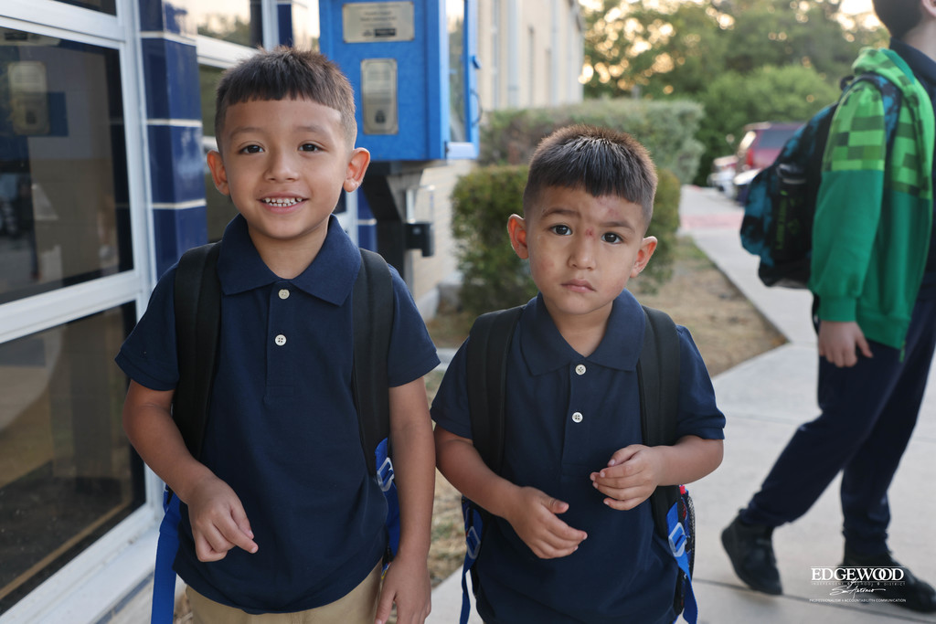 brothers head into class for the first day of school at RDLA