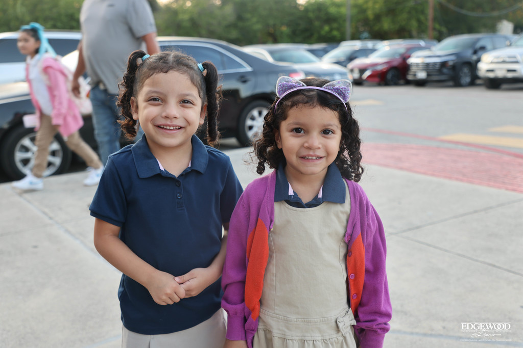 Two sisters smile big as they begin school at RDLA