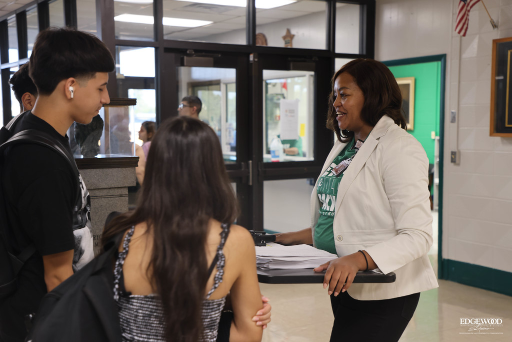 New assistant principal Ms. Robinson welcomes students to JFK for the first day