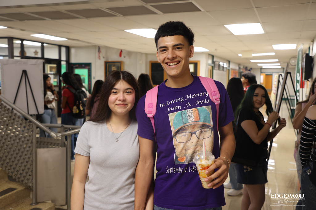 Students smile for the first day of school at JFK