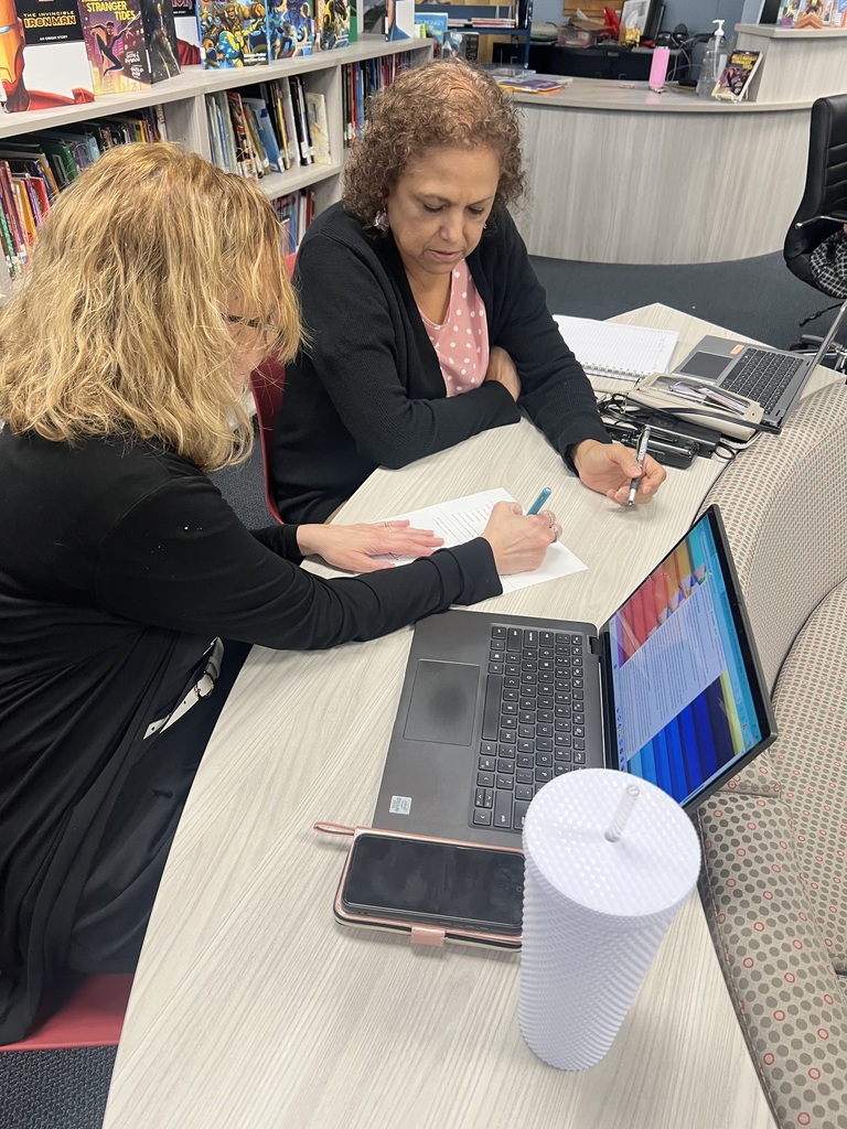 Mrs. Benavides and Mrs. Urbina working on strategies to solve these math problems!