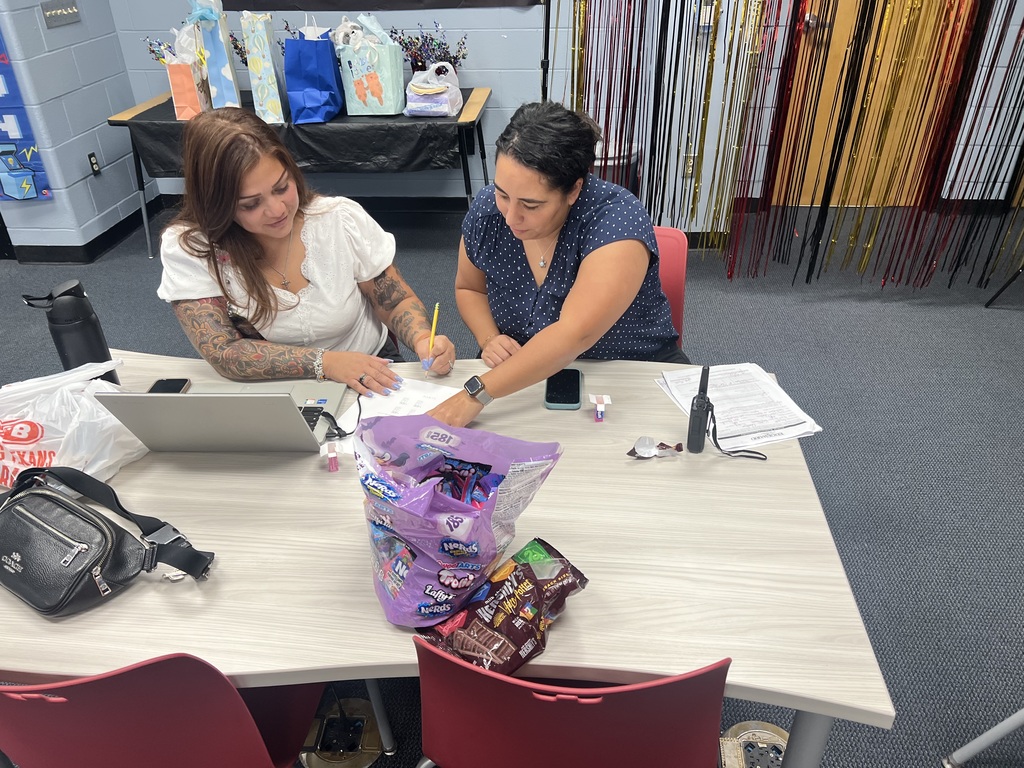 Mrs. DeHoyos and Ms. Cardenas working hard.