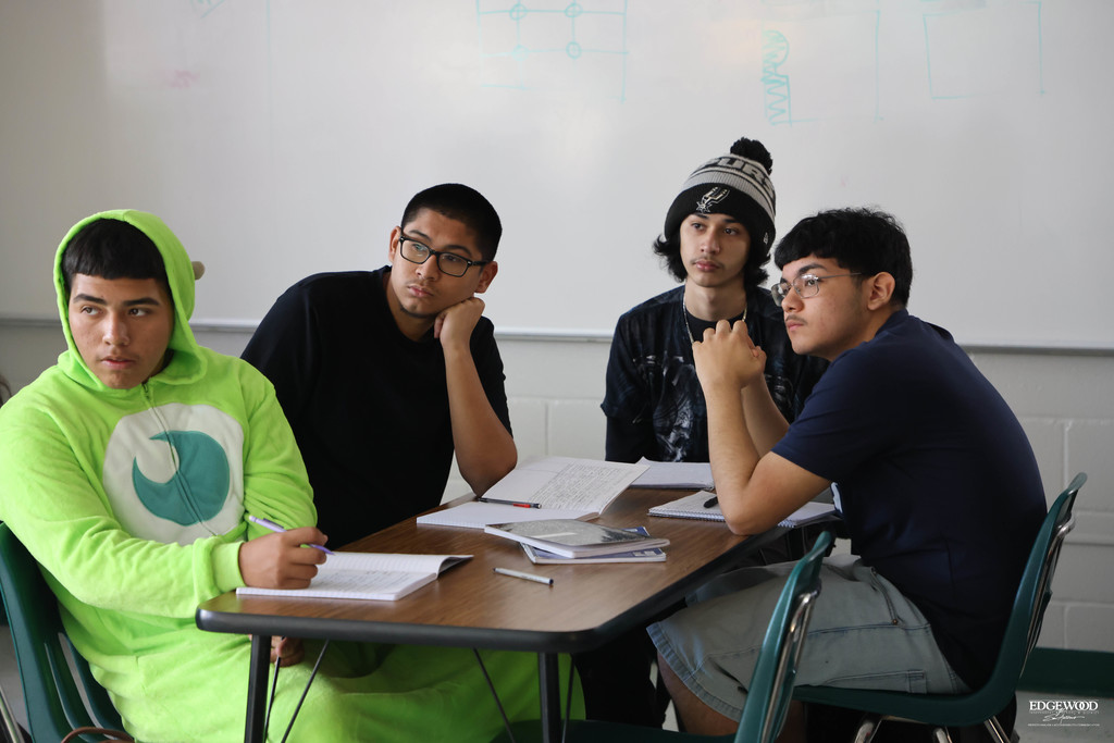 JFK journalism student listens to lecture on framing photos