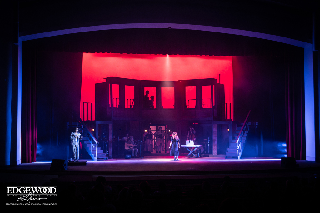 Photo of student actors on stage during Hadestown