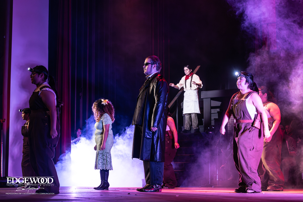 Photo of student actors on stage during Hadestown