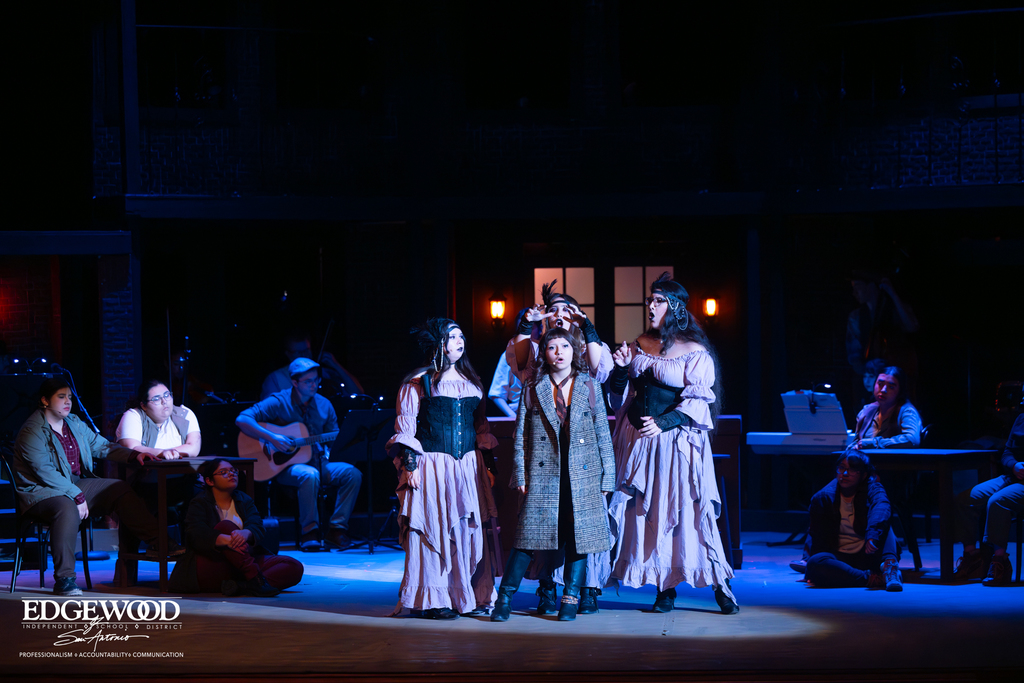 Photo of student actors on stage during Hadestown