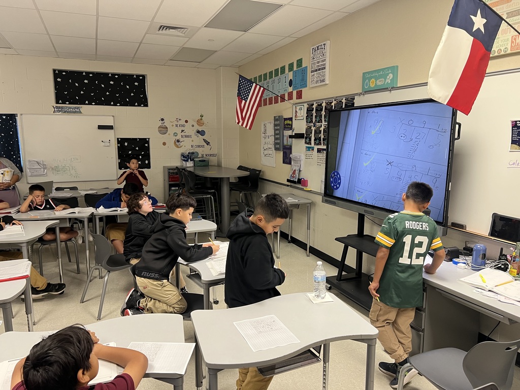  Learning math in 4th grade. Student being communicators and explaining the problem solving process.