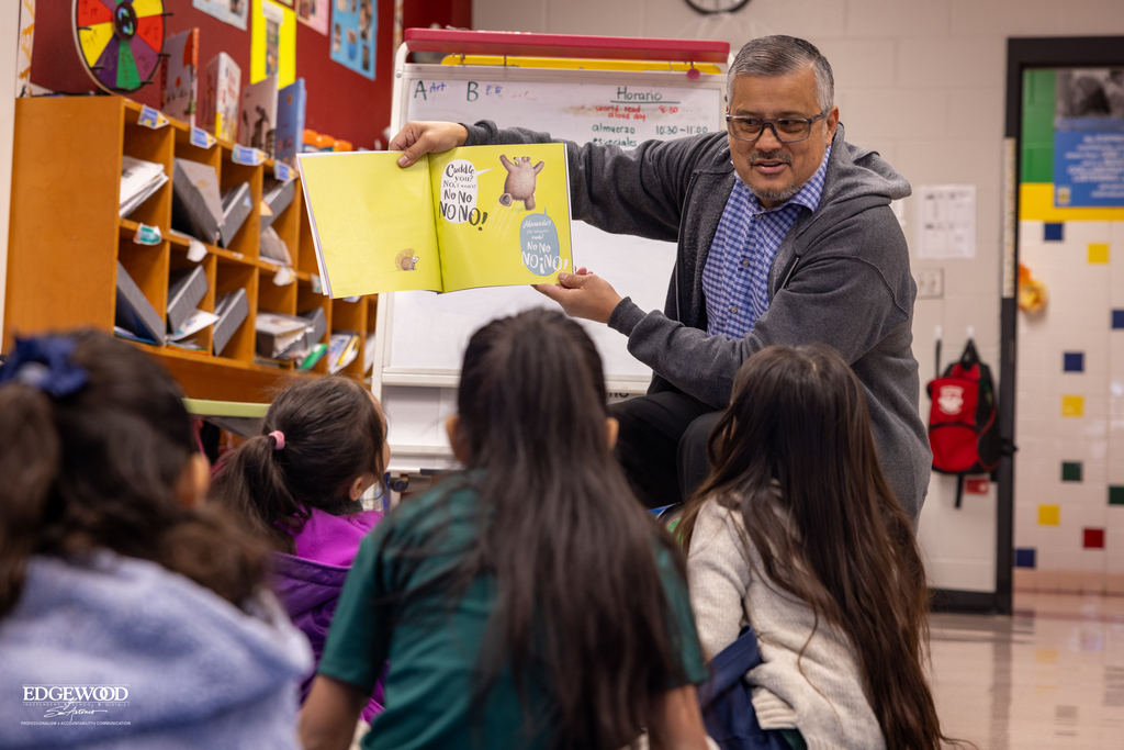 Mr. Abundis reads to students at LPLSG