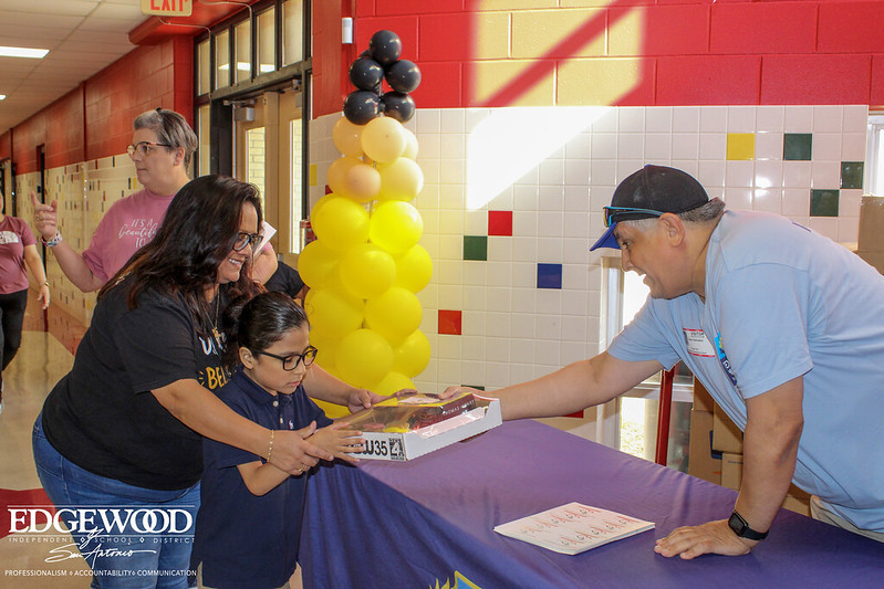 Family accepting supplies
