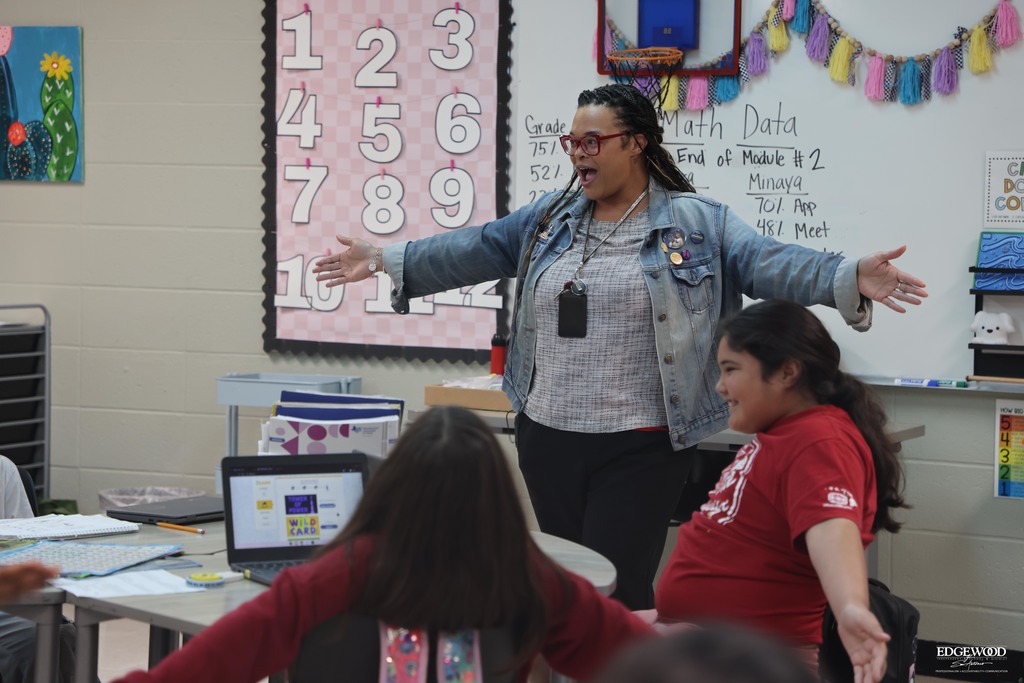 Principal Priestly leading a class