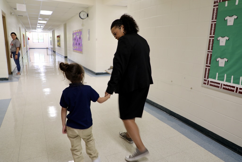 Principal Priestley with a student