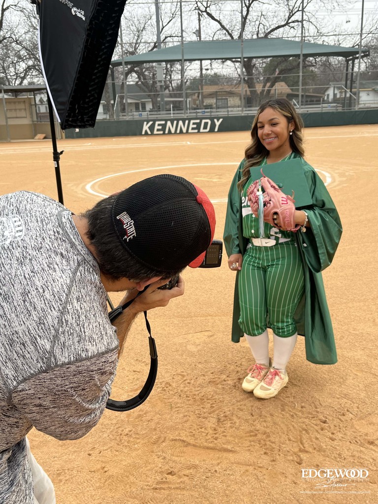 behind the scenes photo of a Kennedy softball player