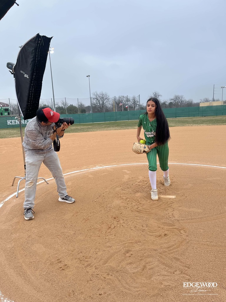 behind the scenes photo of a Kennedy softball player