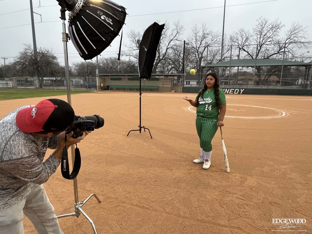 behind the scenes photo of a Kennedy softball player