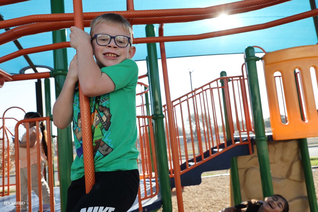 GLEP student plays on the playground