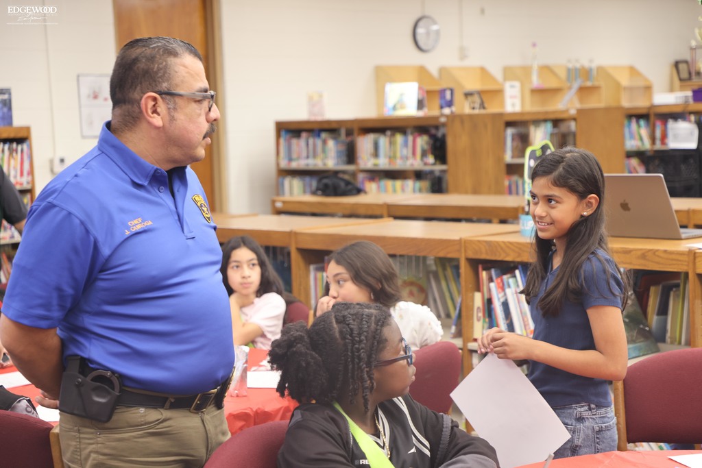LJB Student talks with Chief Quiroga
