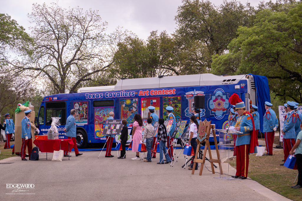 Art contest finalists with the Via bus