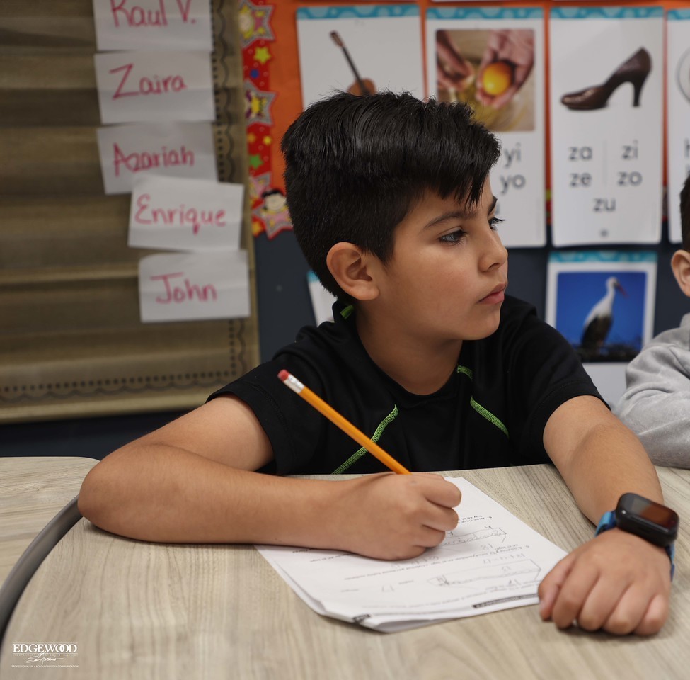 student working on classwork