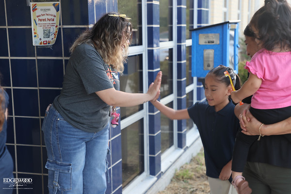 Para welcoming students to school
