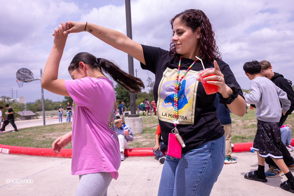 Teacher and student enjoying raspa day 