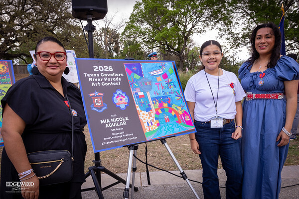 Principal and staff with student supporting student in are achievement in the 2026 River Parade Art Contest