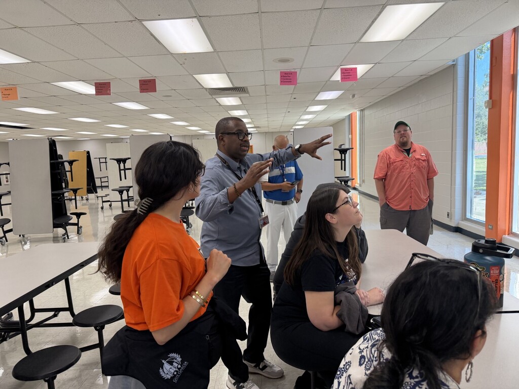 Mr. Wilson with staff