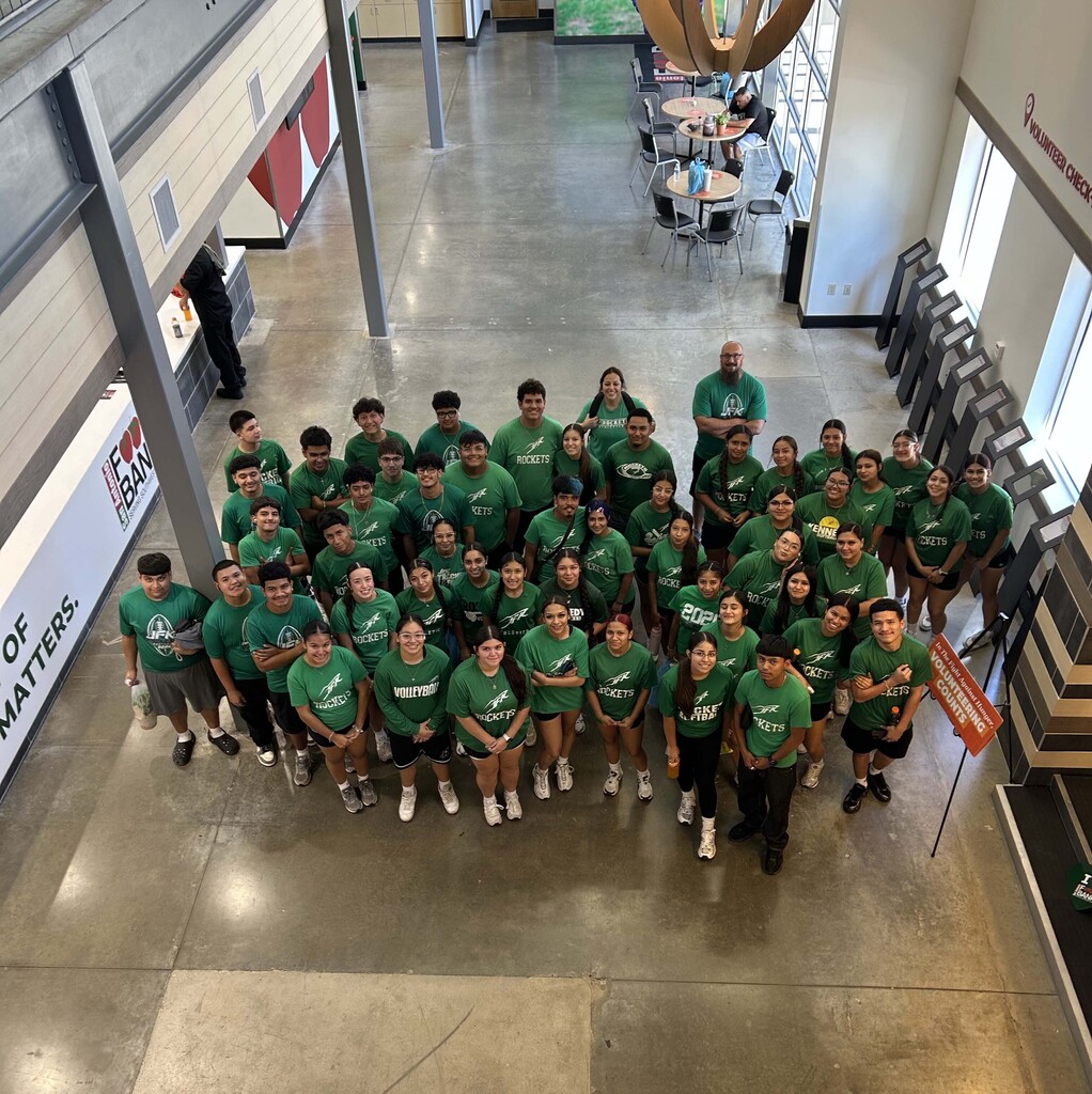 group photo of the JFK Athletes at the Food Bank