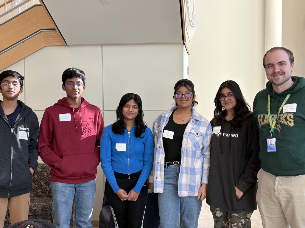 5 students and 1 teacher at Hawk Hack competition