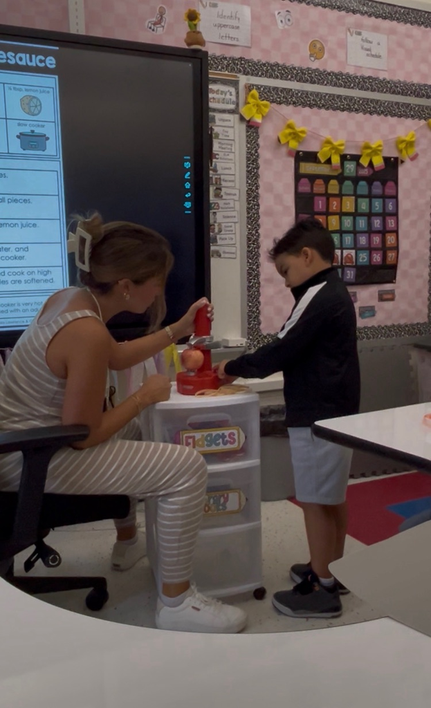 students making applesauce