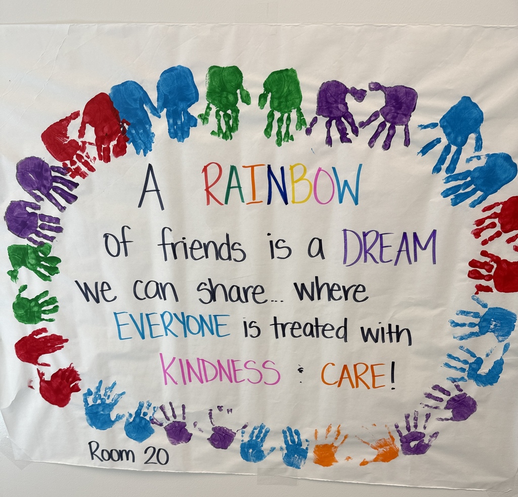 A white banner with colorful handprints of children that says: A Rainbow of Friends is a dream we can share...where Everyone is treated with kindess and care