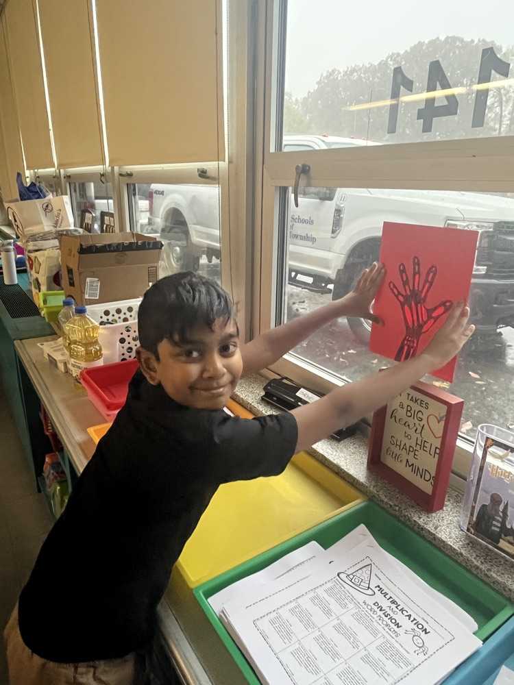 student with hand skeleton