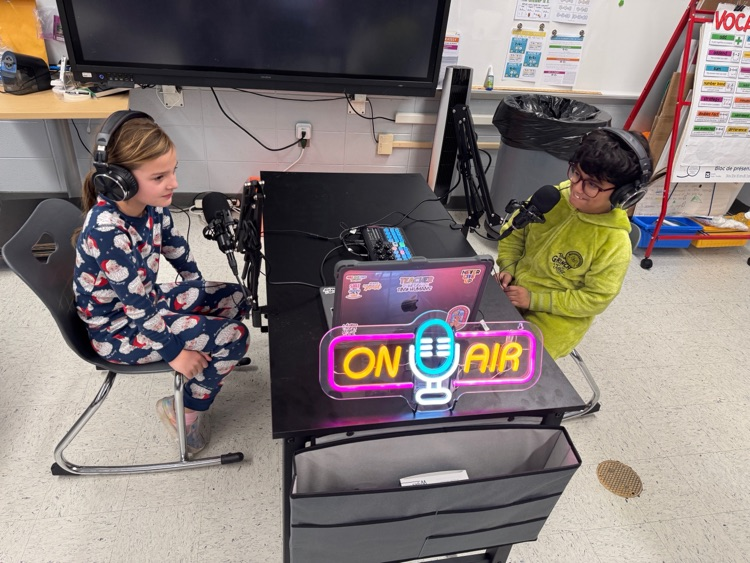 students recording themselves using new equipment 