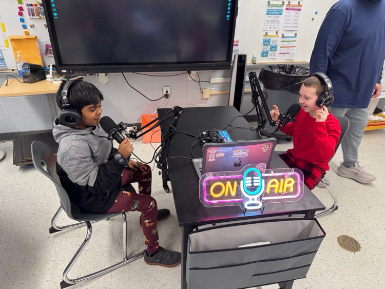 students recording themselves using new equipment 